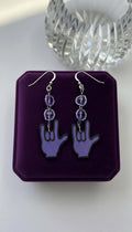 Handmade earrings featuring shrink plastic, Czech crystals, and .995 silver drops