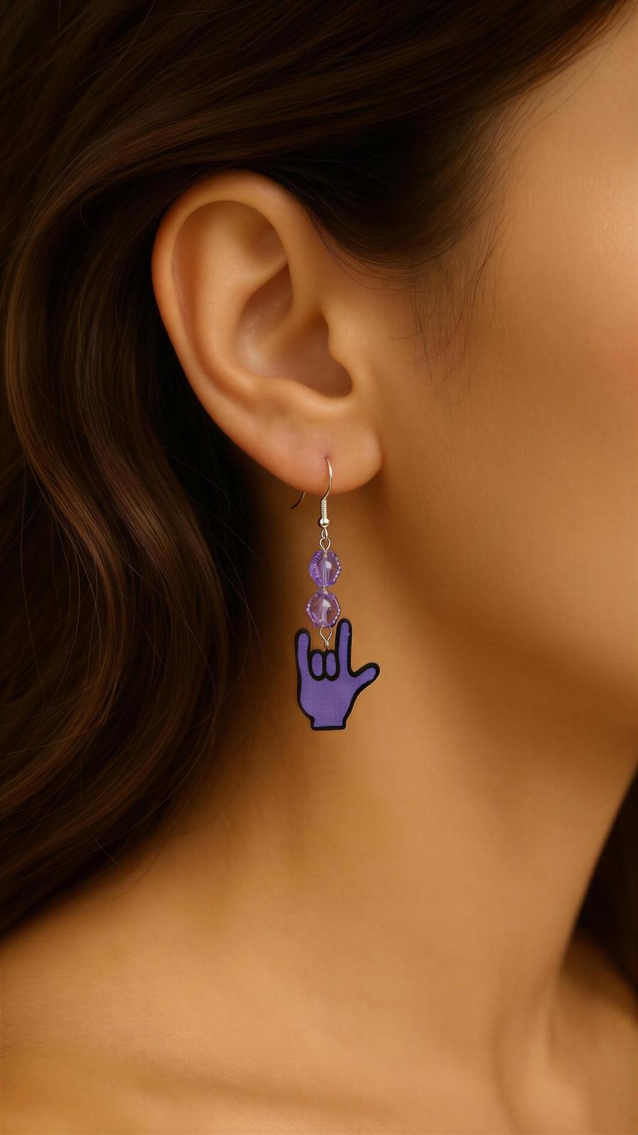 Handmade earrings featuring shrink plastic, Czech crystals, and .995 silver drops