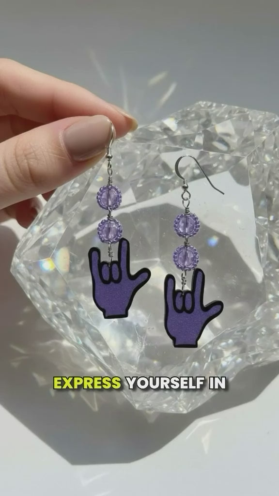 Handmade earrings featuring shrink plastic, Czech crystals, and .995 silver drops