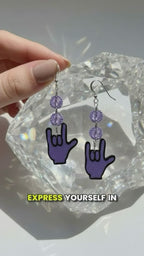 Handmade earrings featuring shrink plastic, Czech crystals, and .995 silver drops